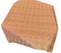 Decorative fabric with intricate patterns on a red and gray surface